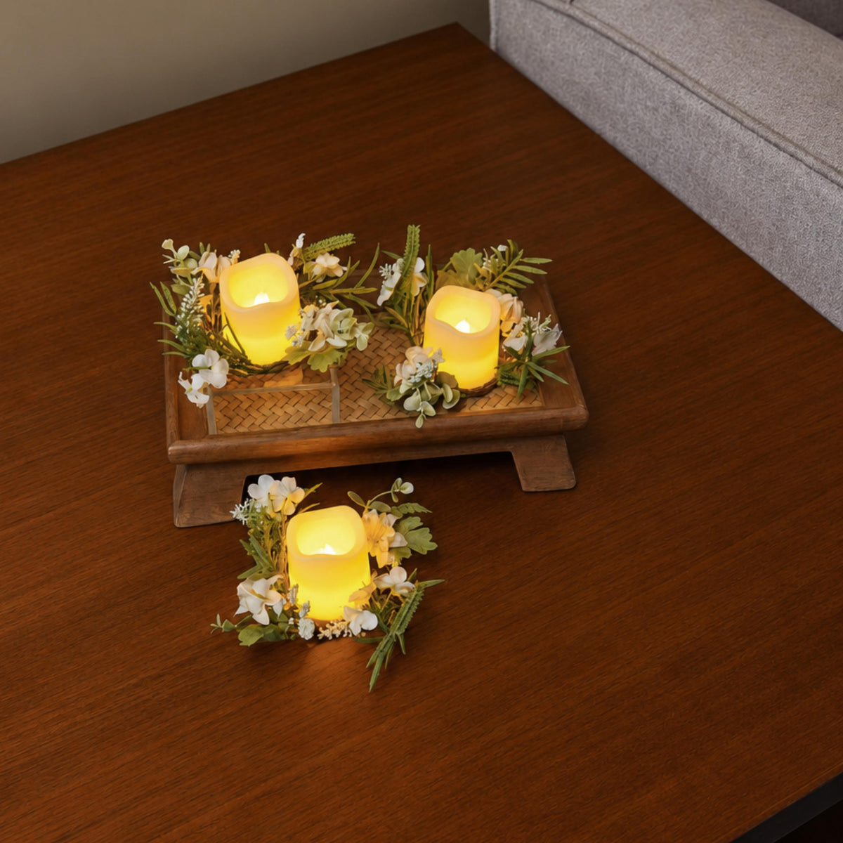 Six Amalfi Candle Rings on clear acrylic risers down the centre of a laid dining table