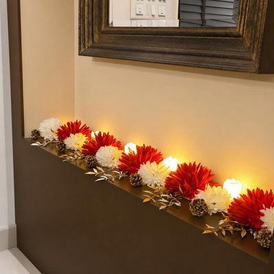 Flower runner on a wood console below a mirror