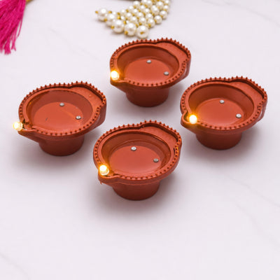Battery operated LED diyas lined up in a row