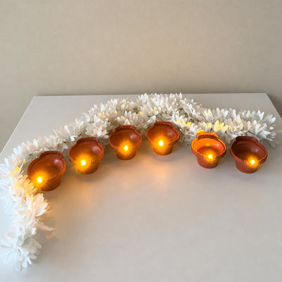 Battery operated LED diyas grouped together