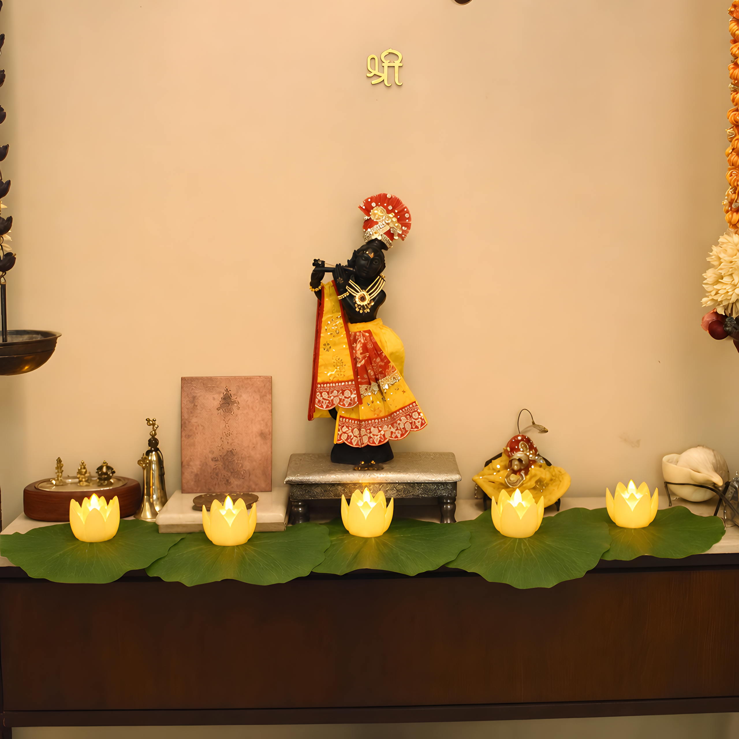 Lotus leaf mats and LED lotus lights in a festive pooja setup