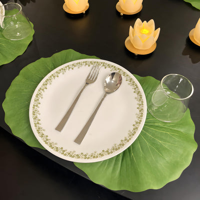 Overhead lotus leaf place mat with dinner plate and LED lotus lights