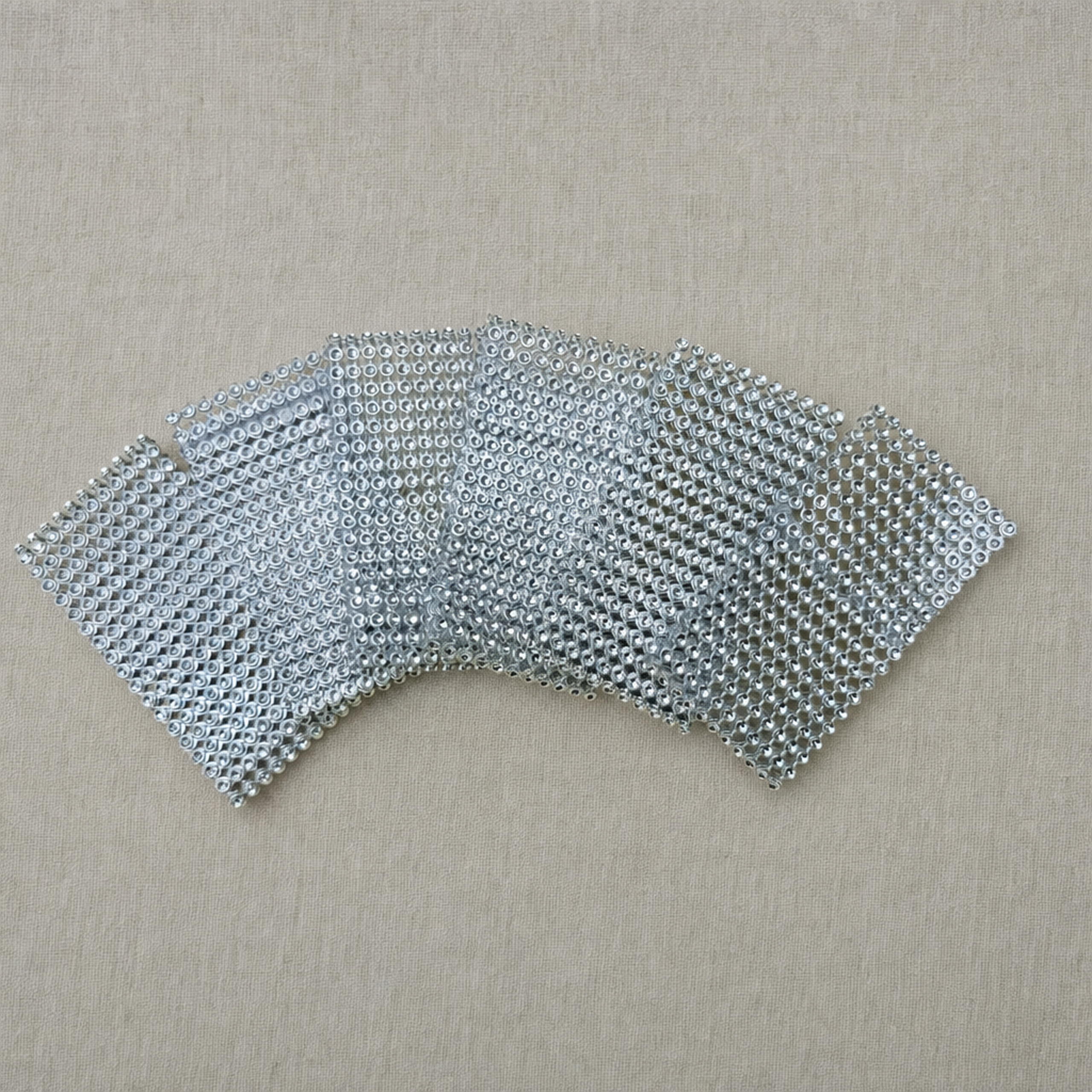 Silver rhinestone napkin ring bands fanned out